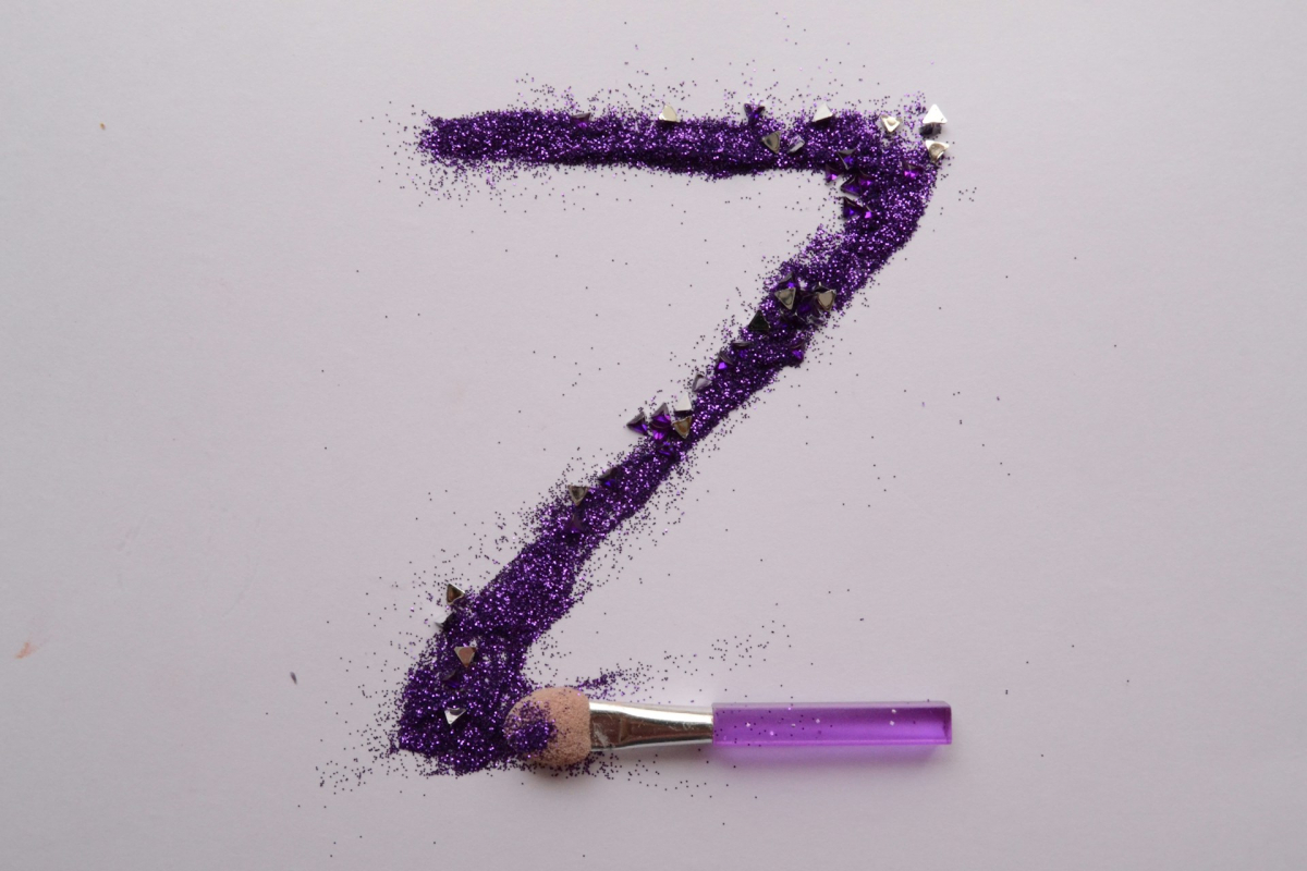 letter Z formed by glitter and brush